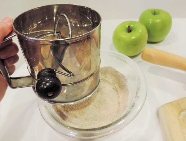 Sifting Apple Pie Bar Spices