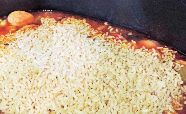 Rice into Crock Pot Gumbo